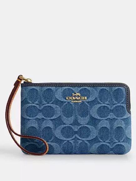 Coach Denim Signature Wristlet In Blue With Brown Strap